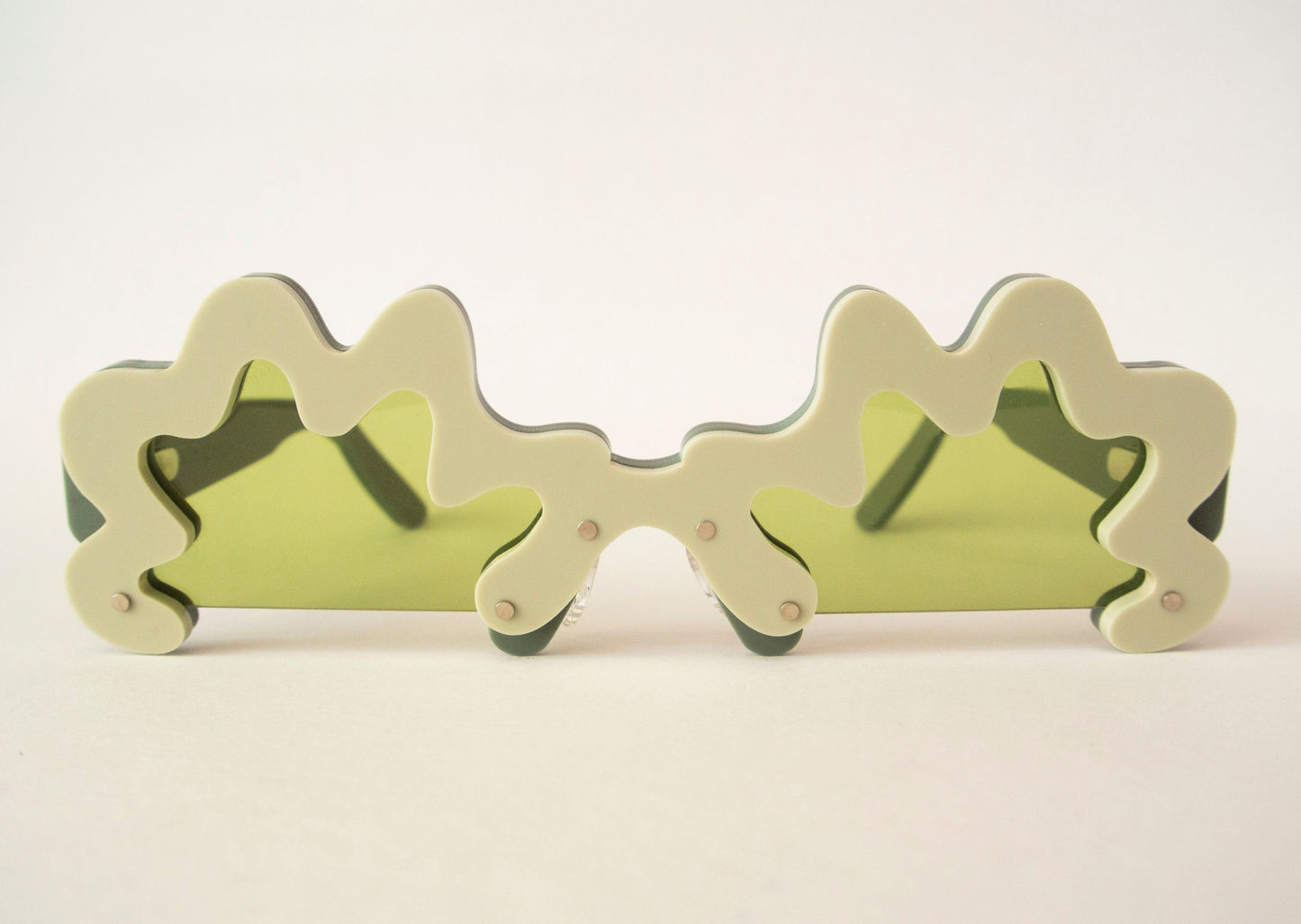 wavy green glasses with green lenses