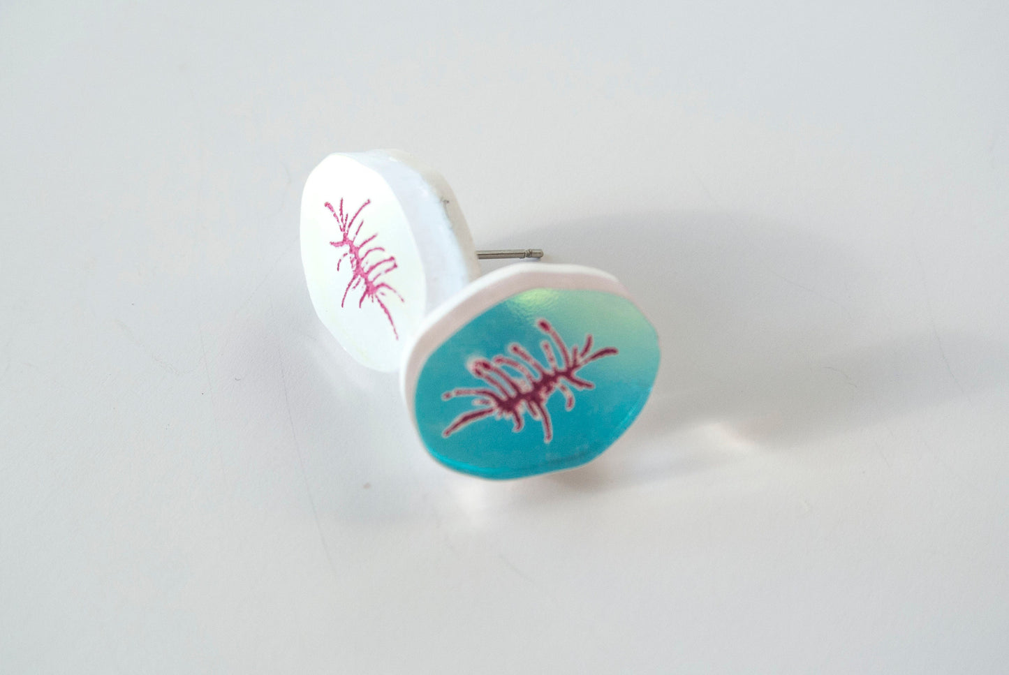 little bum hole earrings