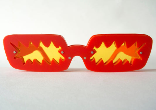 Red sunglasses with yellow lenses by Animalhair