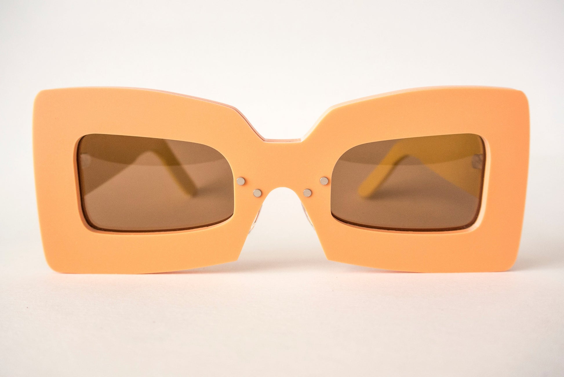 orange square glasses with brown lenses, 70s style