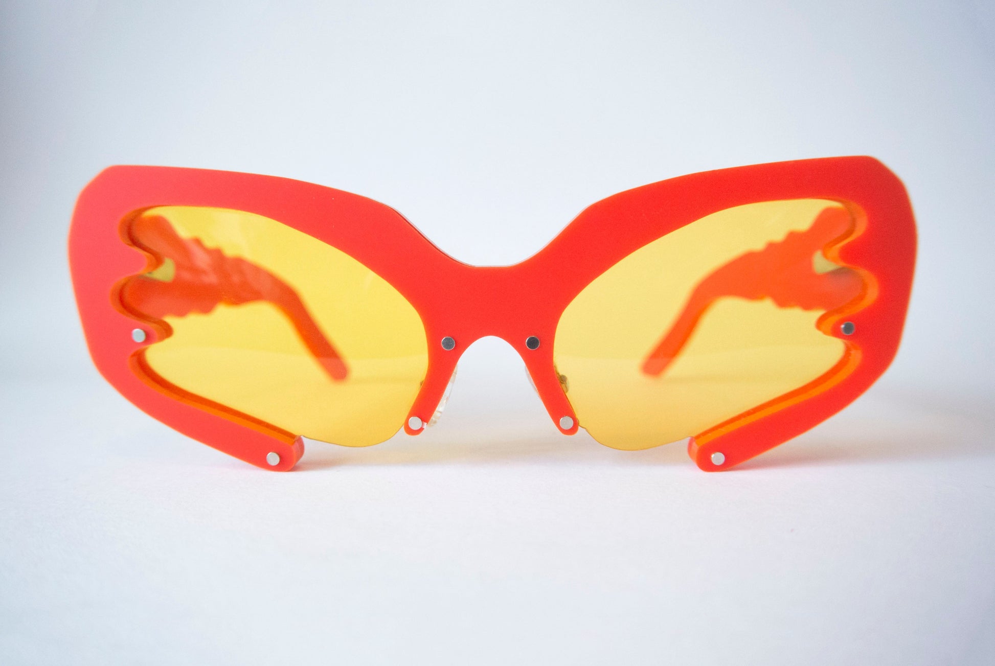 Bright red bug Y2K style glasses with yellow lenses