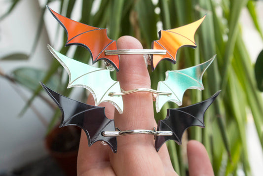 Bat wing tiny glasses that go on the end of your nose