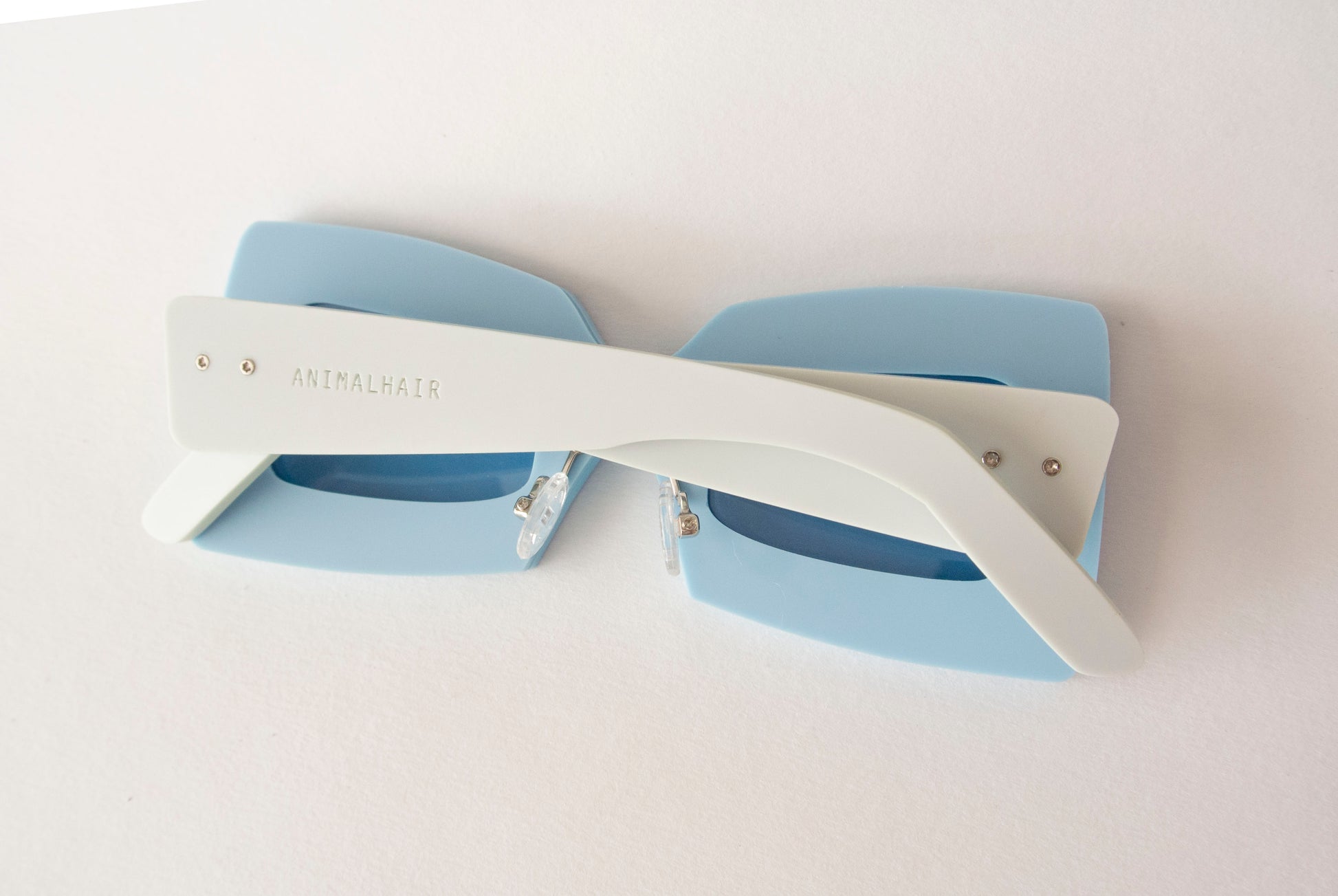 back view of animalhair blue square eyes glasses
