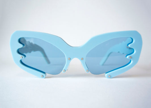 Blue Y2K style sunglasses with blue lenses