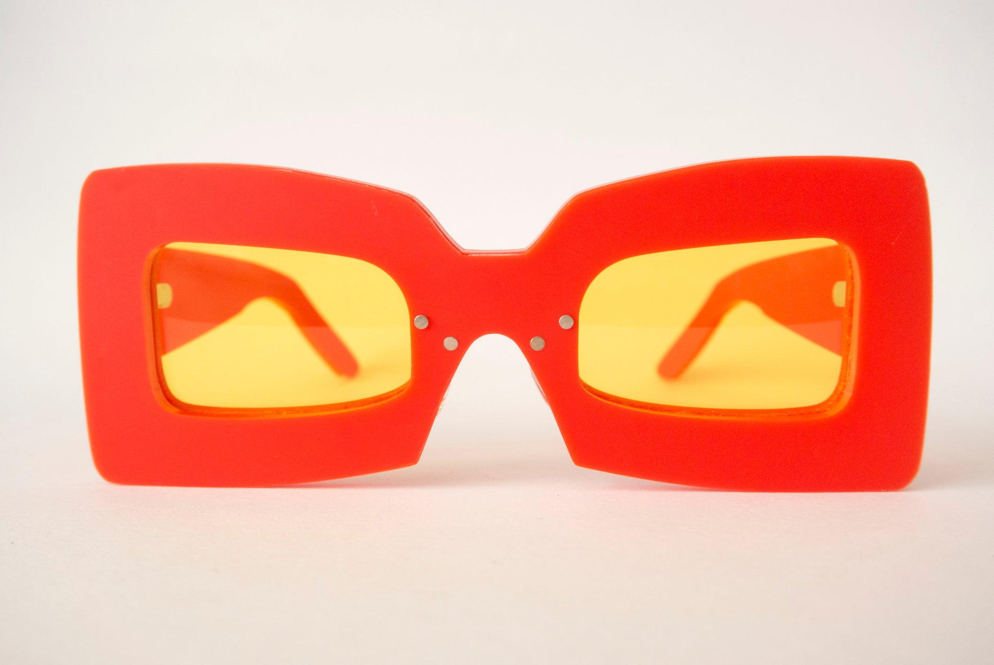 bright red glasses with yellow lenses, mcdonalds sunglasses