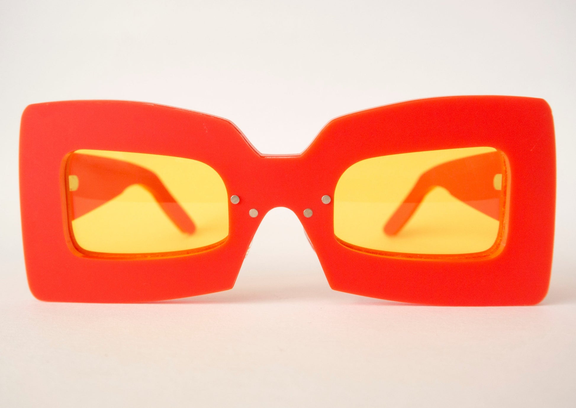 bright red glasses with yellow lenses, mcdonalds sunglasses