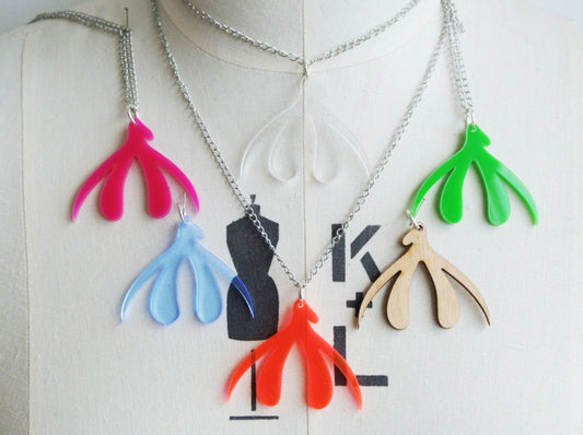 Laser Cut Clit Necklaces for FGM Charity