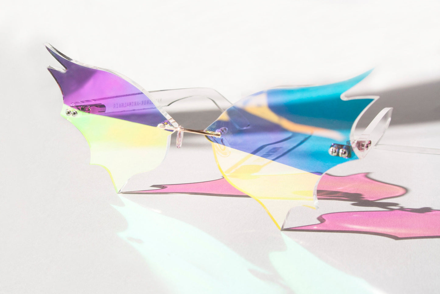 Iridescent bat wing glasses by Anna Mulhearn
